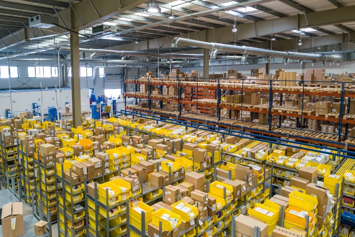 A fulfillment warehouse with organized racks and bins